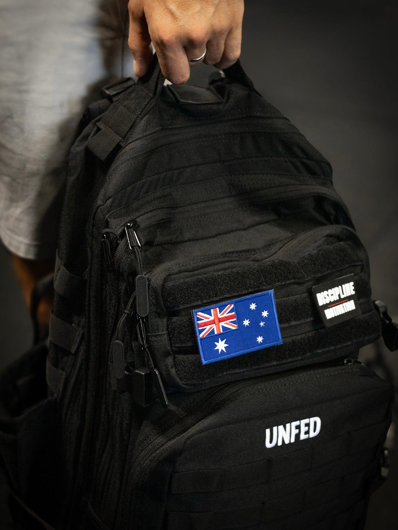 UnFed Club 45L Stealth Black gym backpack lifestyle shot