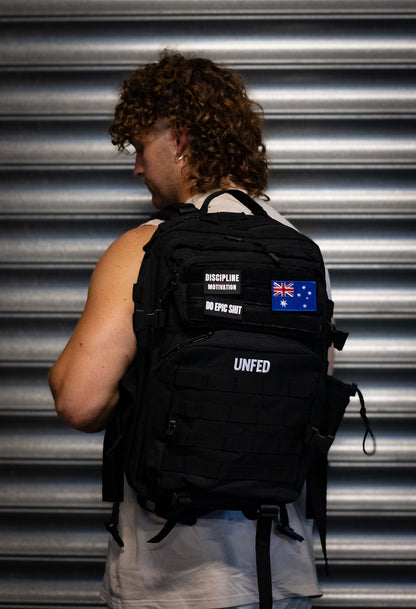 UnFed Club 45L Stealth Black backpack side profile - structured shape