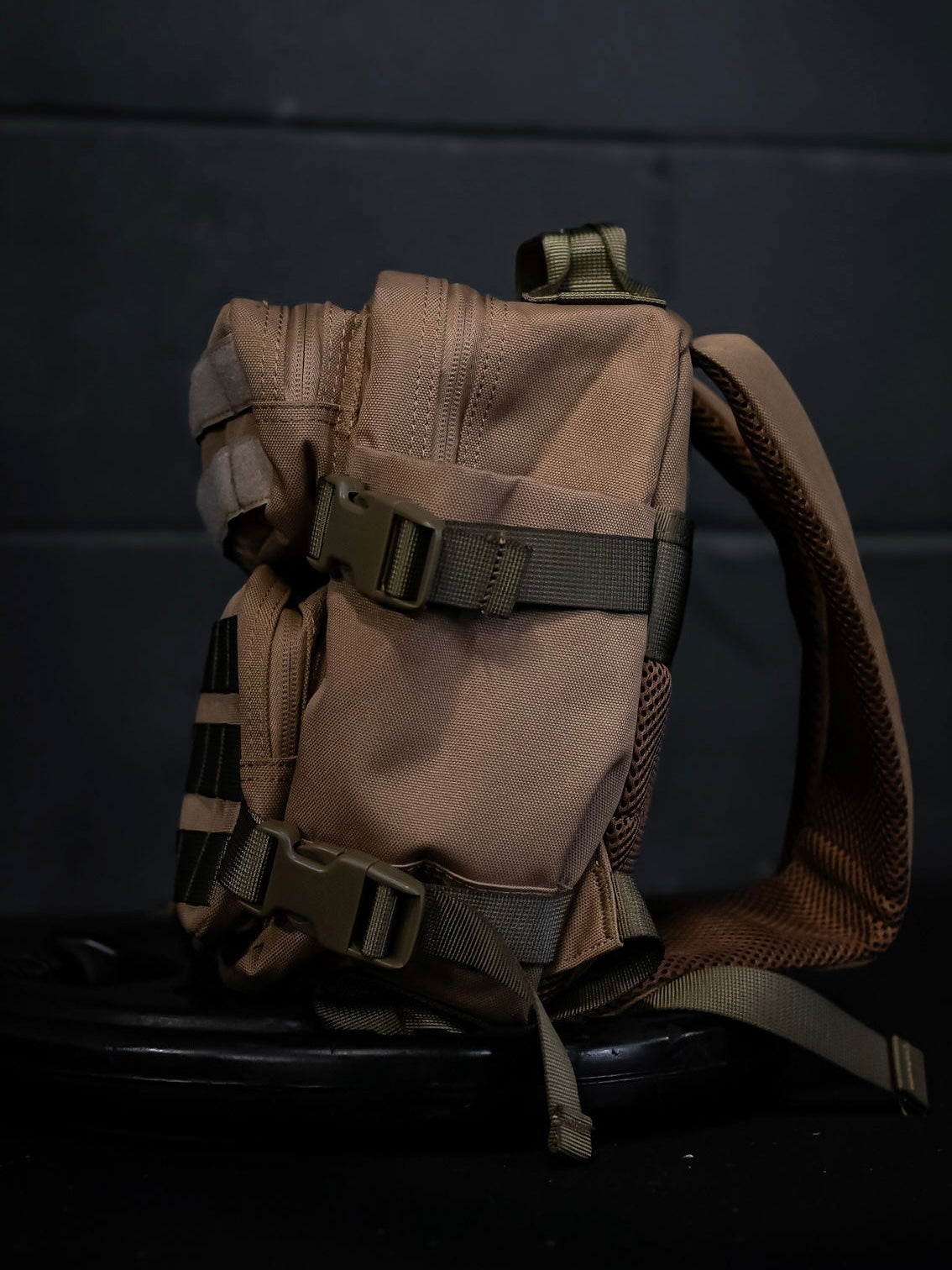 9L Earth Brown mini backpack open compartment showing internal organisation