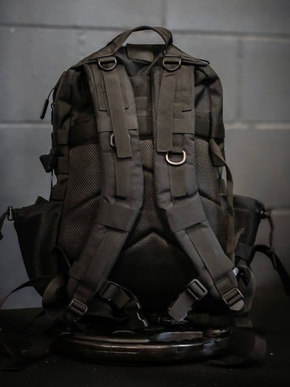 45L Stealth Black backpack open compartment showing meal prep organisation